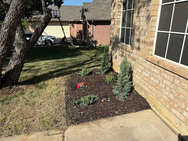 view of yard with a garage