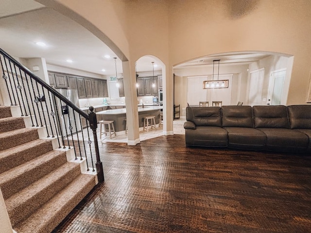 living room with a high ceiling