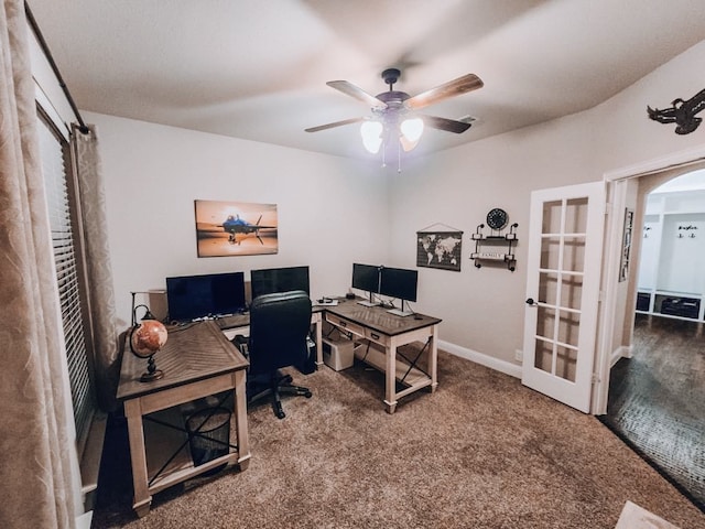 office area featuring carpet, ceiling fan, and french doors