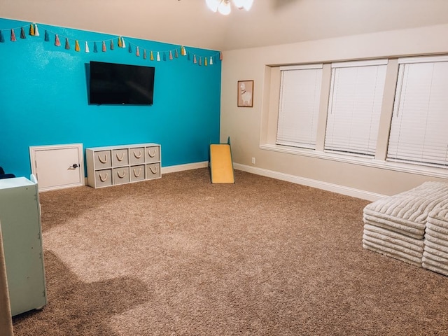 unfurnished room with carpet flooring