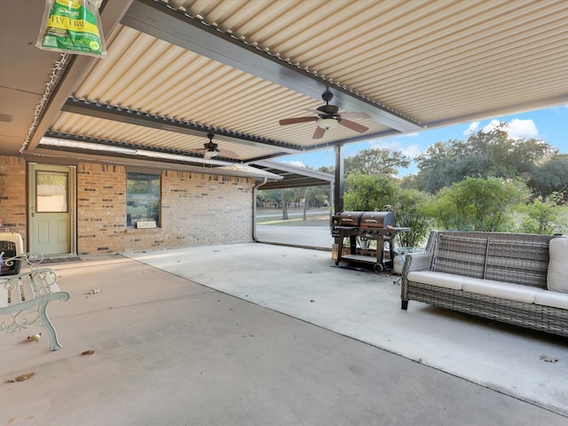 view of patio / terrace with area for grilling, ceiling fan, and an outdoor hangout area