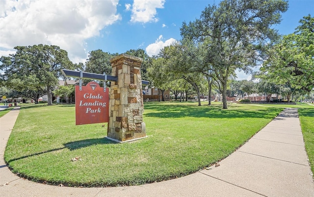 surrounding community with a yard