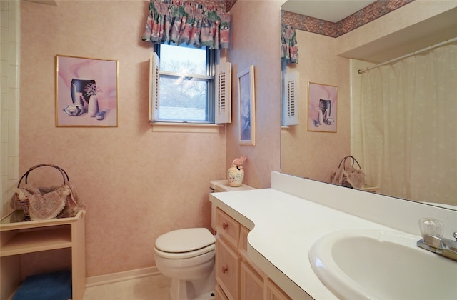 bathroom with vanity, toilet, tile patterned flooring, and a shower with shower curtain