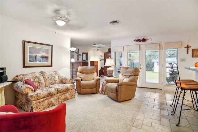 living room featuring ceiling fan