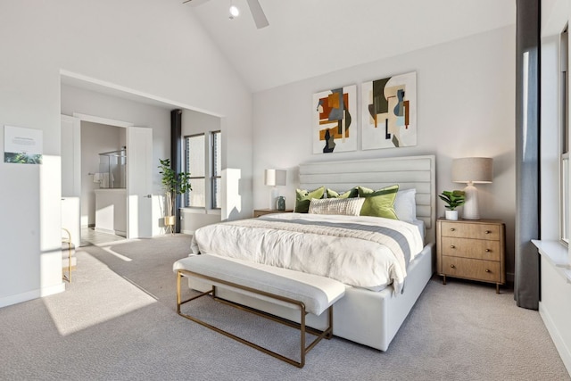 carpeted bedroom featuring high vaulted ceiling and ceiling fan