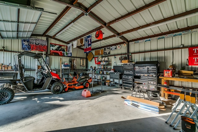 565 Turkey Ridge Rd, Stephenville, TX 76401 - garage with a workshop area and metal wall