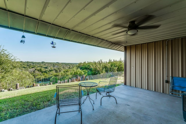 view of patio featuring ceiling fan