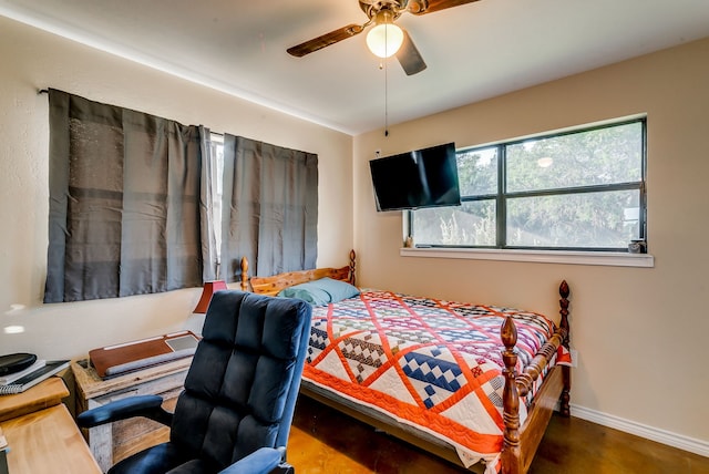 565 Turkey Ridge Rd, Stephenville, TX 76401 - bedroom featuring a ceiling fan and baseboards