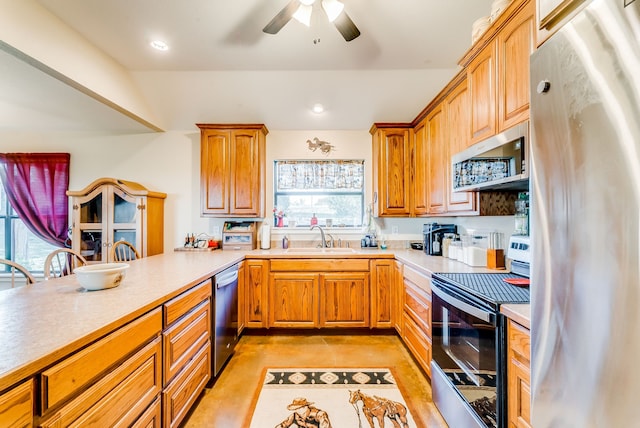 565 Turkey Ridge Rd, Stephenville, TX 76401 - kitchen with appliances with stainless steel finishes, a sink, light countertops, ceiling fan, and recessed lighting