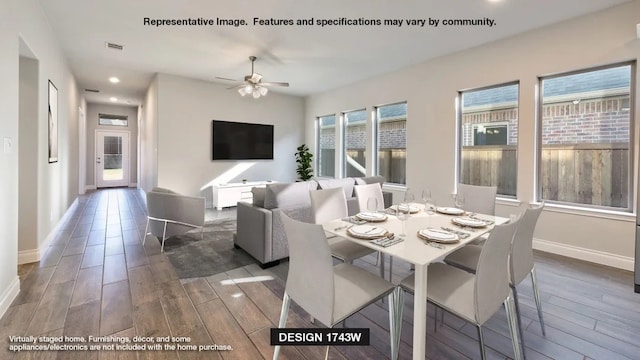 dining area featuring ceiling fan, a healthy amount of sunlight, and hardwood / wood-style floors