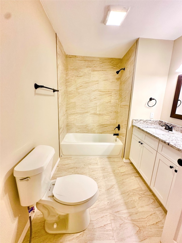 full bathroom with vanity, toilet, and tiled shower / bath combo