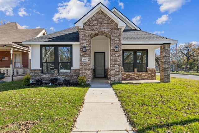 view of front of home with a front lawn