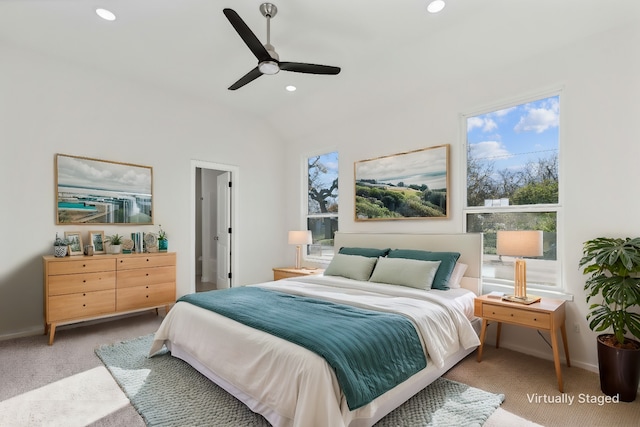 carpeted bedroom with recessed lighting, multiple windows, vaulted ceiling, and ceiling fan