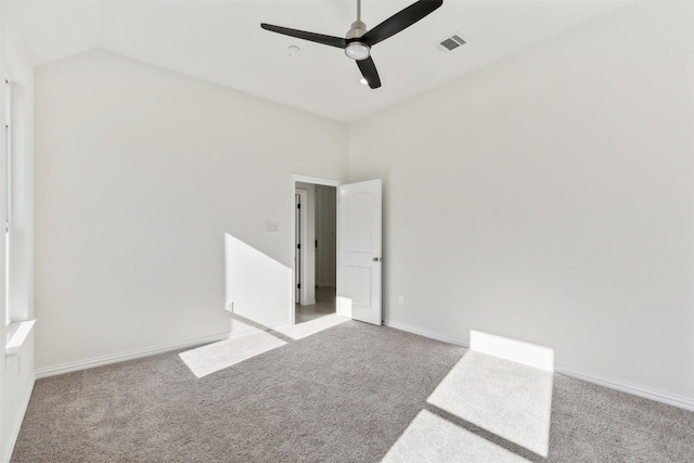 unfurnished bedroom with light colored carpet, visible vents, ceiling fan, and baseboards