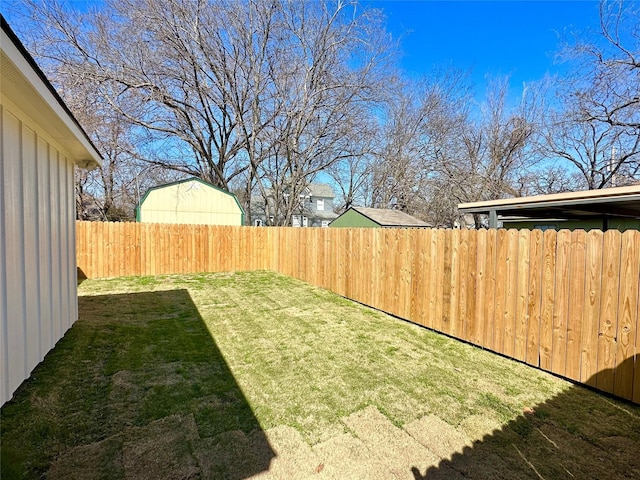 view of yard featuring a fenced backyard