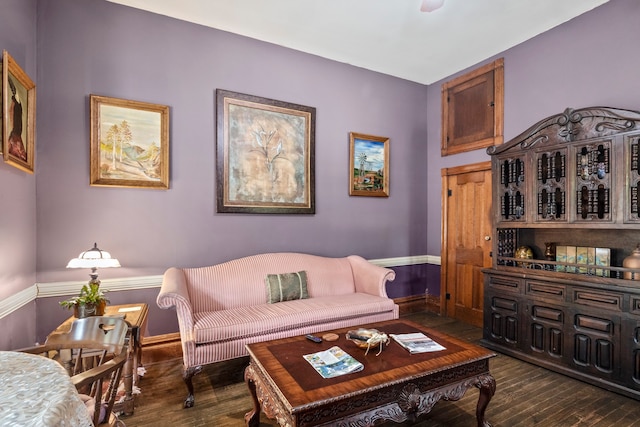 living room with dark hardwood / wood-style floors