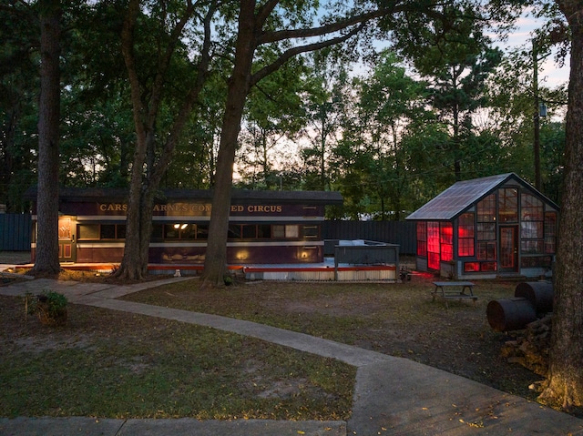 exterior space featuring a storage unit