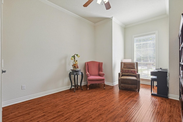 living area featuring dark hardwood / wood-style floors, ceiling fan, and ornamental molding