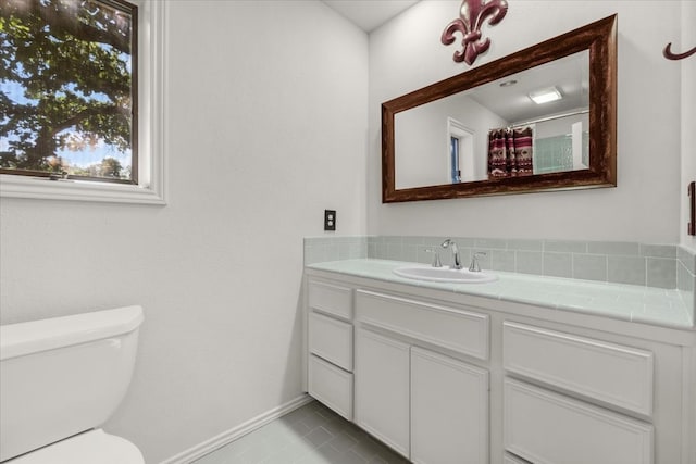 bathroom featuring shower / bath combination with curtain and toilet