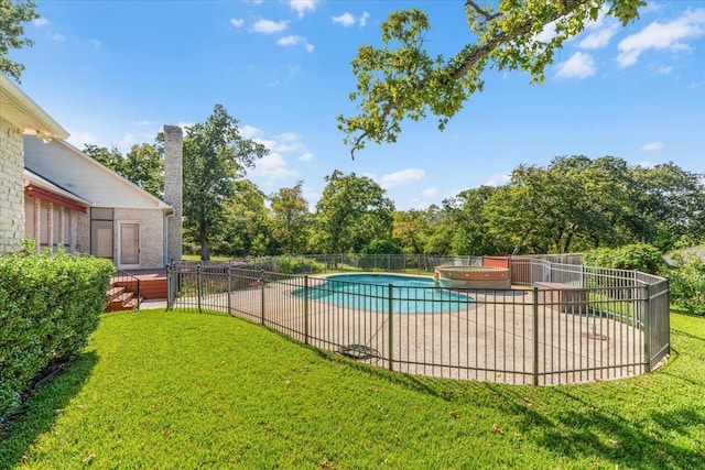 view of swimming pool featuring an in ground hot tub and a patio area