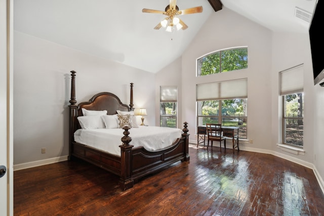 bedroom with multiple windows, ceiling fan, and dark hardwood / wood-style flooring