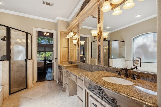 bathroom featuring vanity, tile patterned floors, ornamental molding, and a shower with door