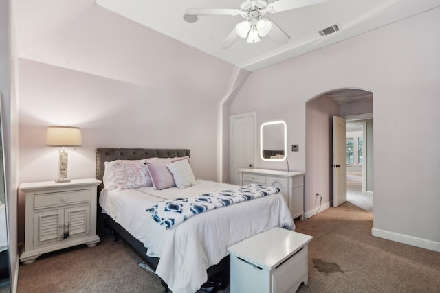 bedroom with lofted ceiling, carpet floors, and ceiling fan