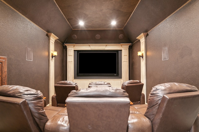 home theater featuring vaulted ceiling