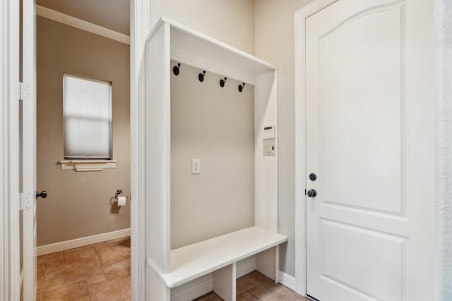 mudroom featuring crown molding