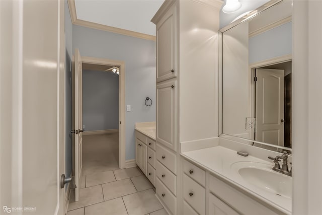 kitchen featuring an island with sink, ornamental molding, sink, light stone countertops, and stainless steel dishwasher