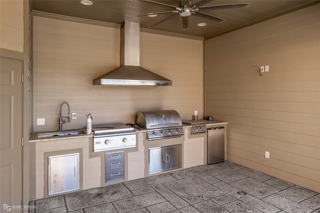 view of patio with exterior kitchen, ceiling fan, sink, and grilling area