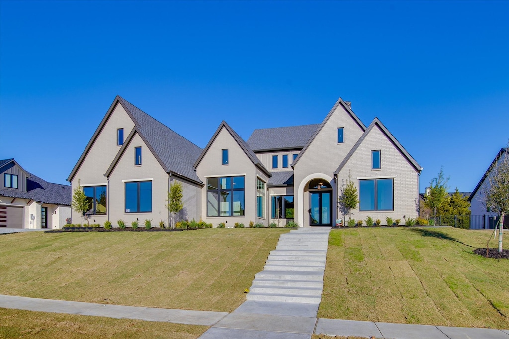 view of front facade with a front lawn