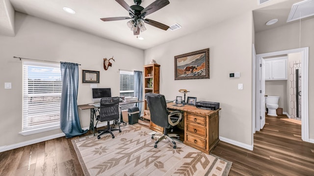 home office featuring ceiling fan and dark hardwood / wood-style flooring