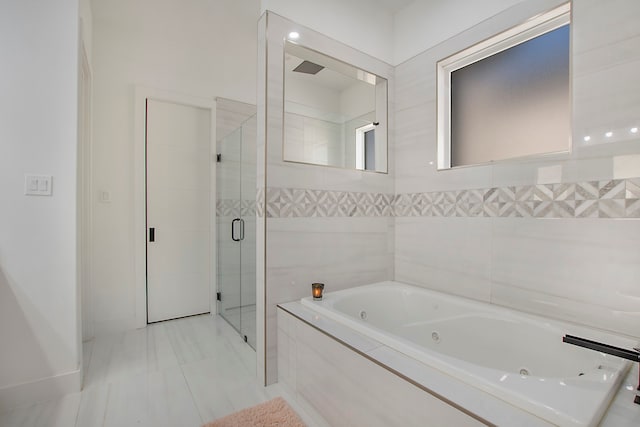 bathroom with independent shower and bath