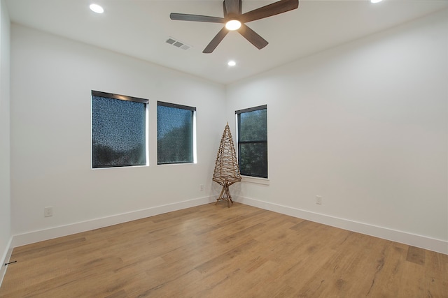 unfurnished room with light hardwood / wood-style floors and ceiling fan