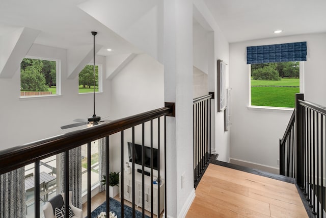 corridor featuring hardwood / wood-style floors