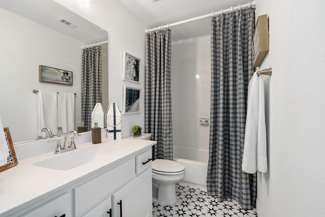 full bathroom with vanity, toilet, and shower / bath combo with shower curtain