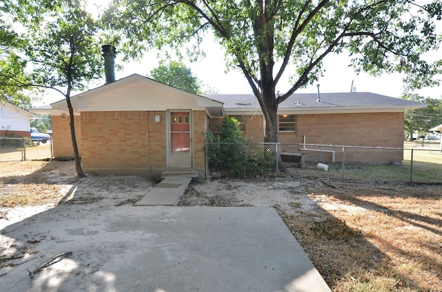 back of property with a patio area