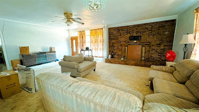 living room featuring ceiling fan, ornamental molding, and carpet floors