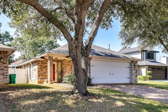 single story home with a garage