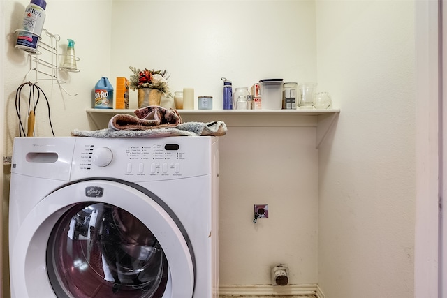 laundry area with washer / dryer