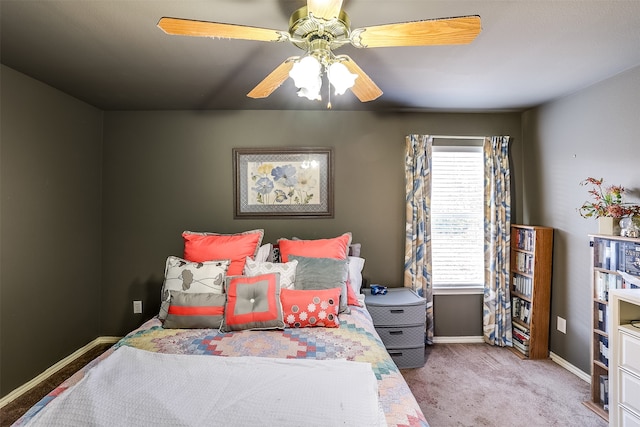 bedroom featuring ceiling fan and carpet floors