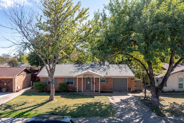 ranch-style house with a front yard and a garage