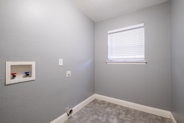 clothes washing area with hookup for a washing machine and electric dryer hookup