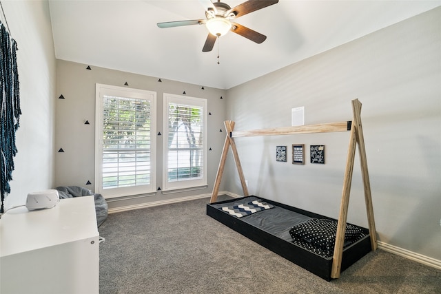 carpeted bedroom featuring ceiling fan