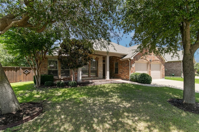 ranch-style house with a front yard and a garage