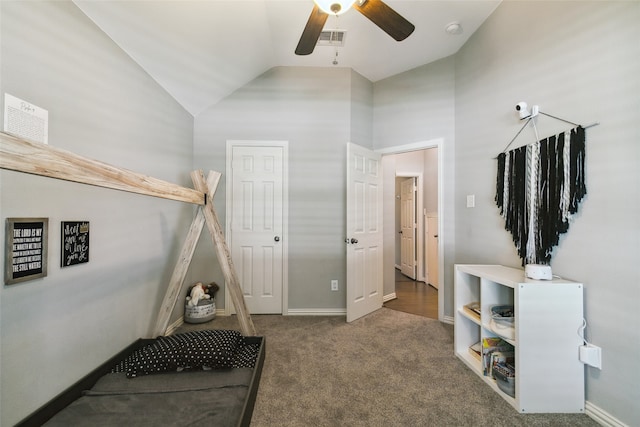 interior space featuring carpet flooring, high vaulted ceiling, and ceiling fan