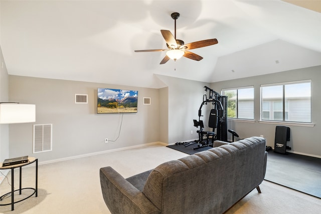 carpeted living room with lofted ceiling and ceiling fan