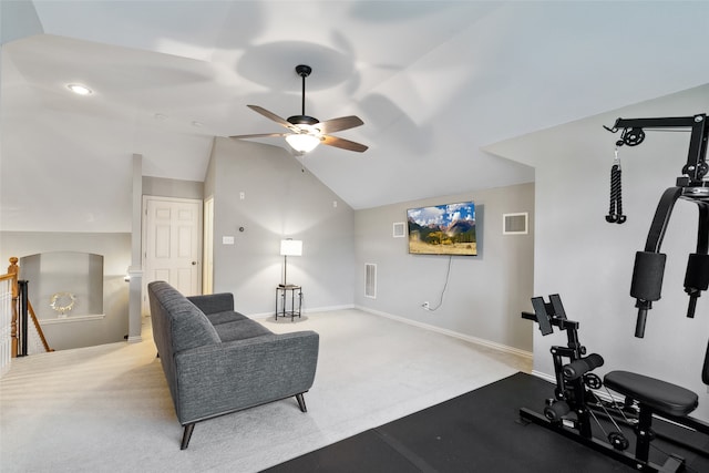 workout area featuring vaulted ceiling, carpet floors, and ceiling fan