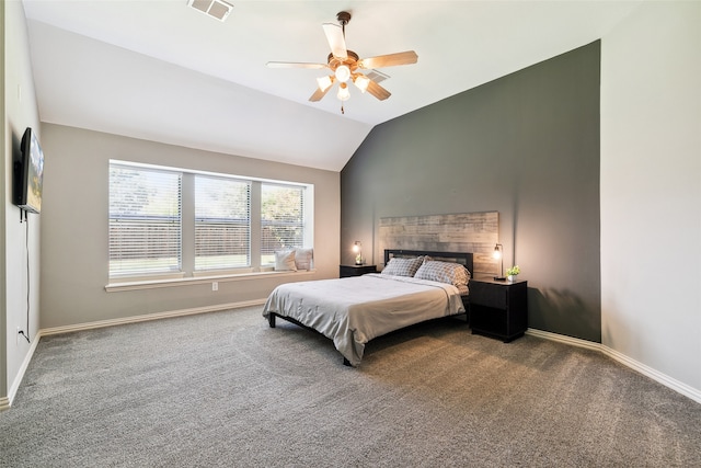 bedroom with vaulted ceiling, carpet flooring, and ceiling fan